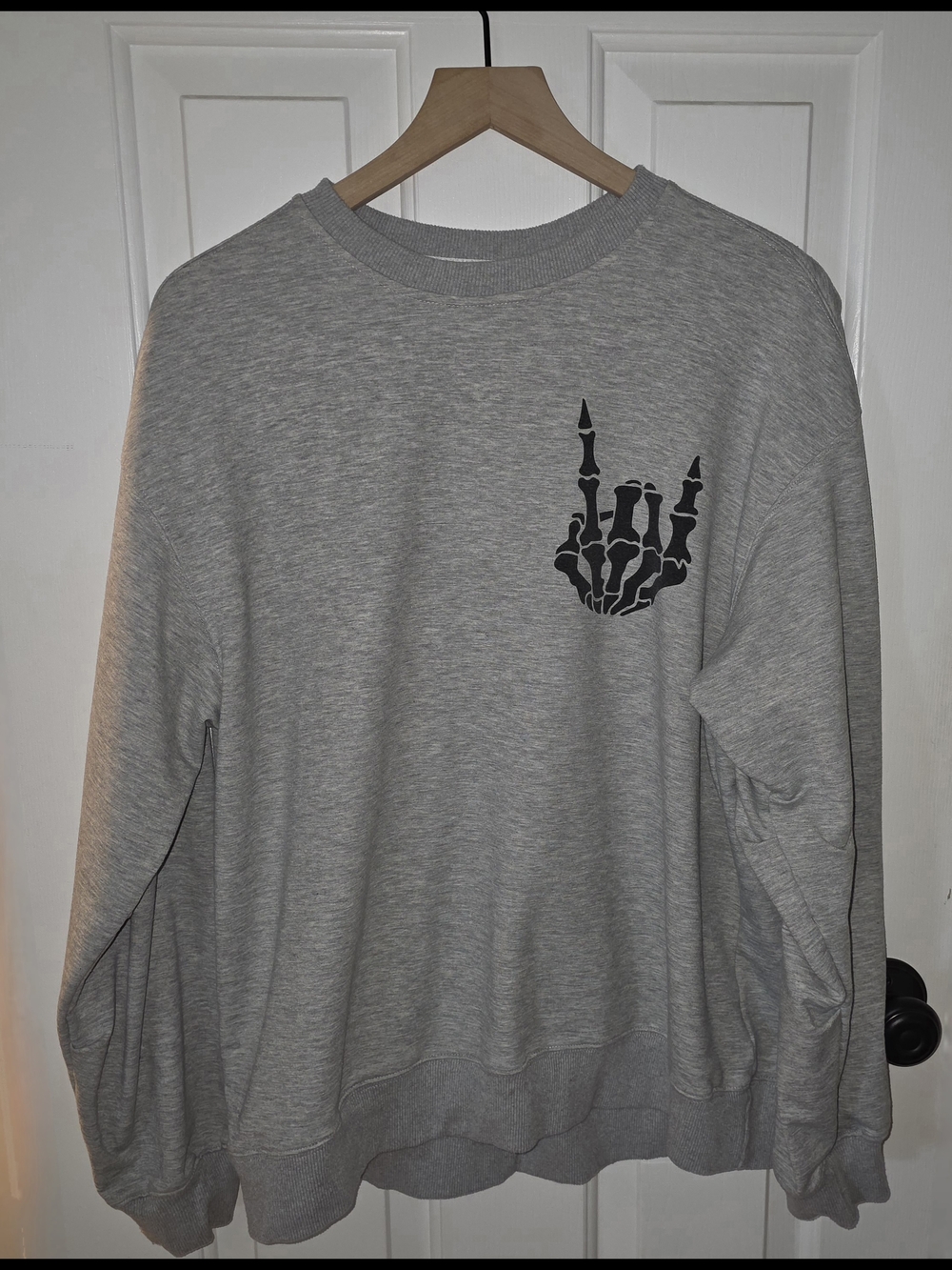 Gray Sweatshirt with Black Skeleton Hand Graphic